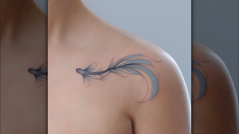 Blue Pisces fish tattoo