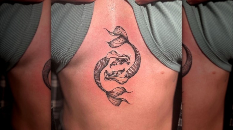 Double mermaid tattoo