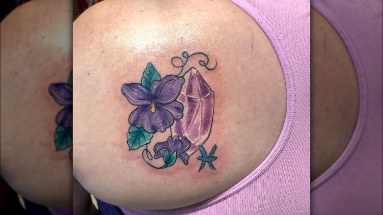 Piscean flower and crystal tattoo