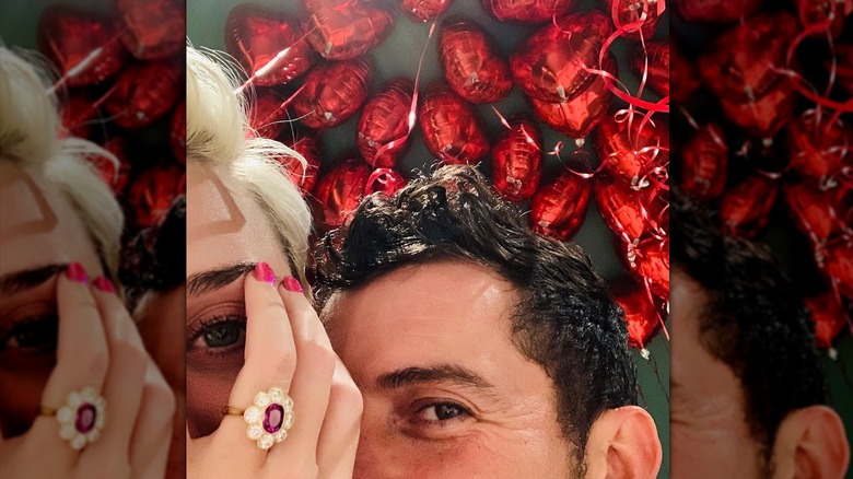 Katy Perry showing her engagement ring with Orlando Bloom