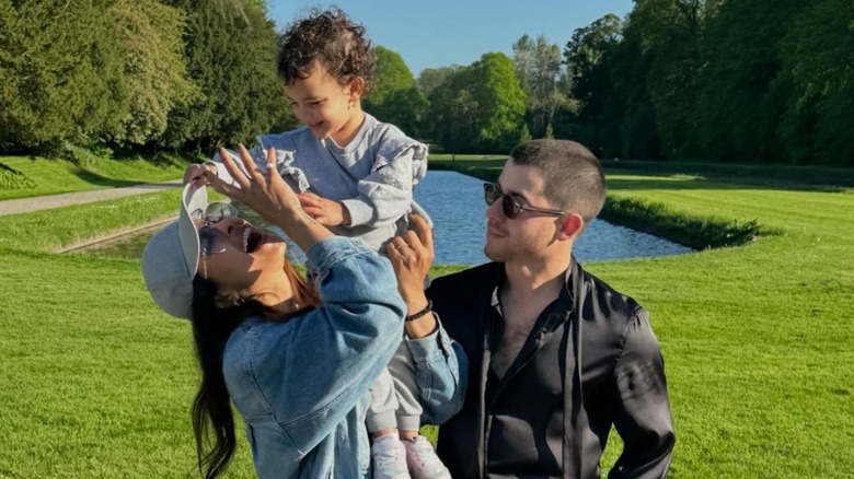 Priyanka Chopra, Nick Jonas, and their daughter