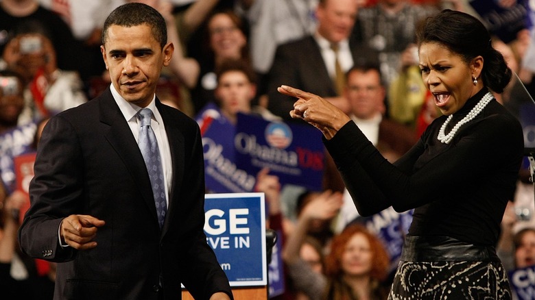 Michelle Obama pointing at Barack Obama