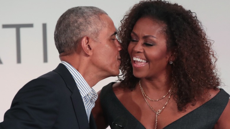 Barack Obama kissing Michelle Obama on the cheek