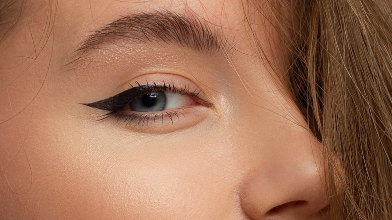 Close up of woman's winged eyeliner