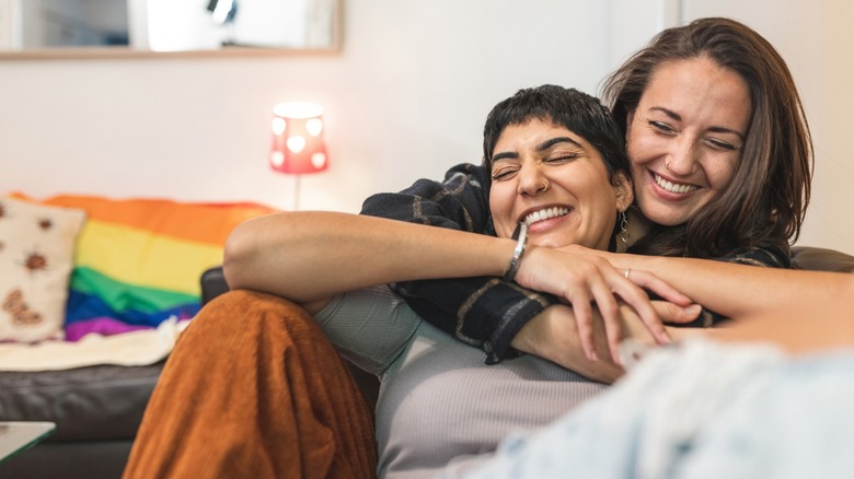 Two people laughing