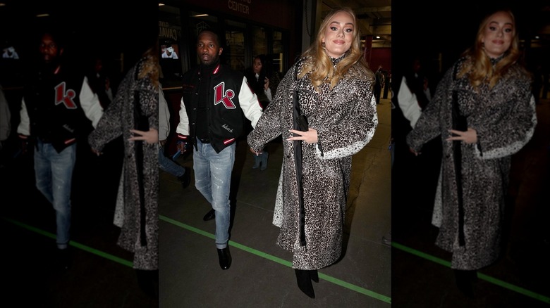 Adele in leopard print with her boyfriend walking outside