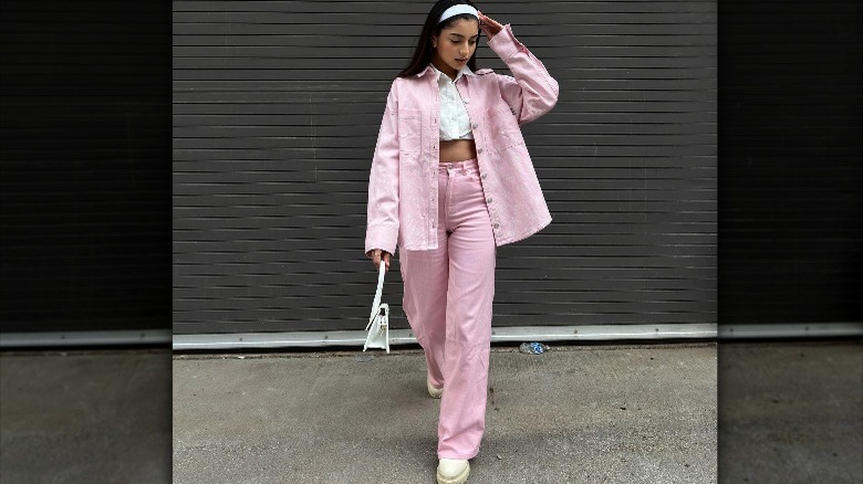 Fashion influencer nandiniibj wearing Sambas with all-pink outfit