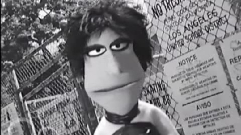 muppet with dark eyeliner