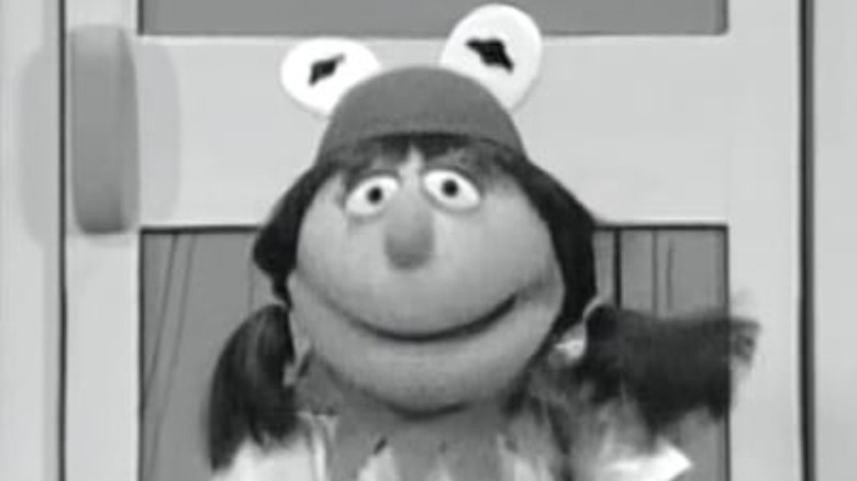 muppet with kermit hat
