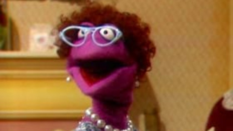 pink muppet with glasses