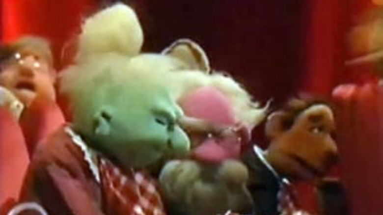 three elderly muppet spectators