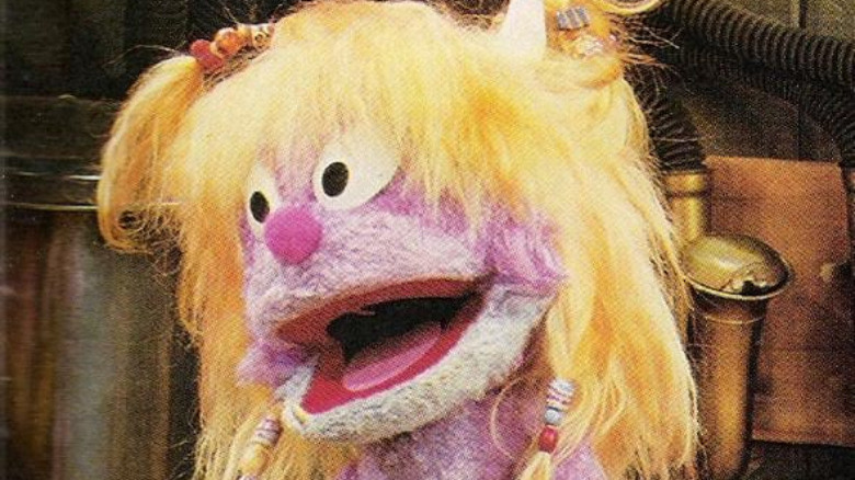 pink muppet with pigtails