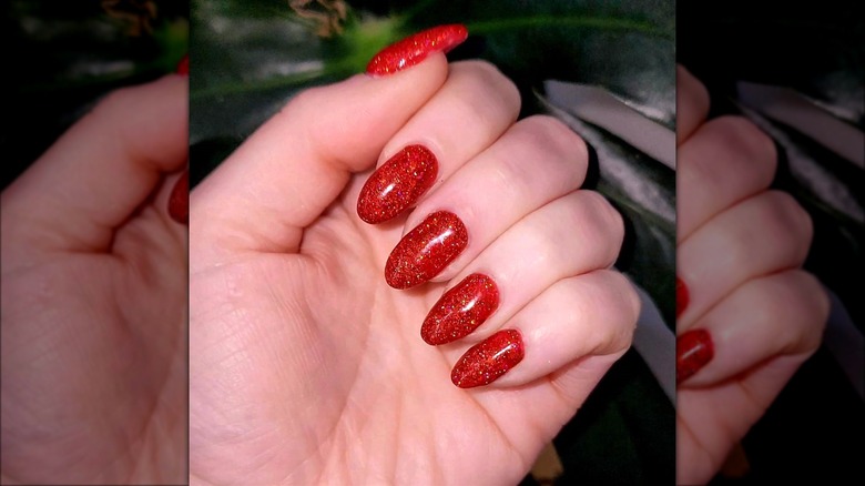 Red glitter manicure