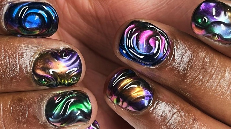 Chrome swirl nail art