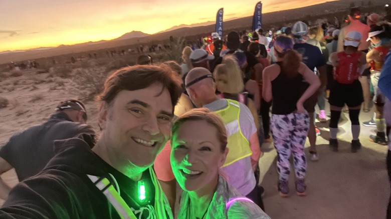 My husband and I running a half marathon that we walked half of
