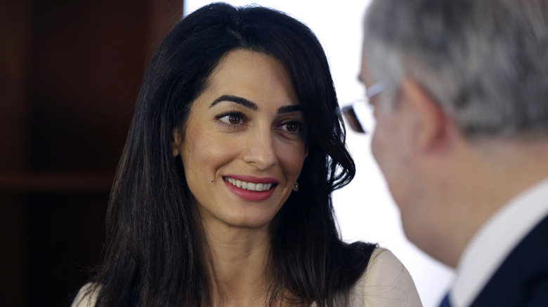 Amal Clooney smiling