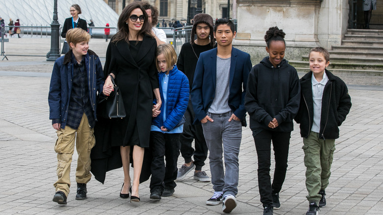 Angelina Jolie and her six children enjoy a day out in Paris