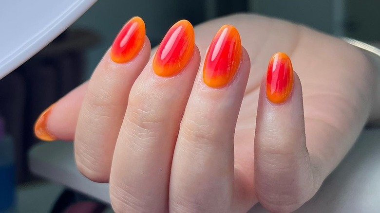 pink and orange aura nails