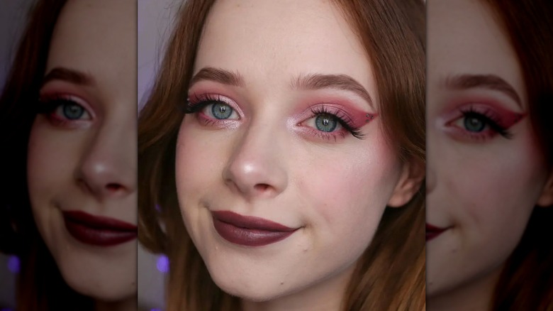 person wearing berry blush 