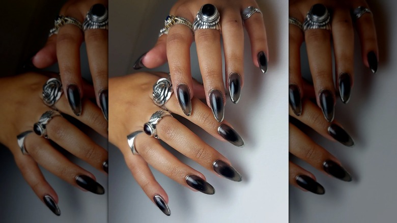 Sheer black aura nails
