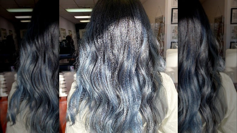 Long black hair with blue highlights