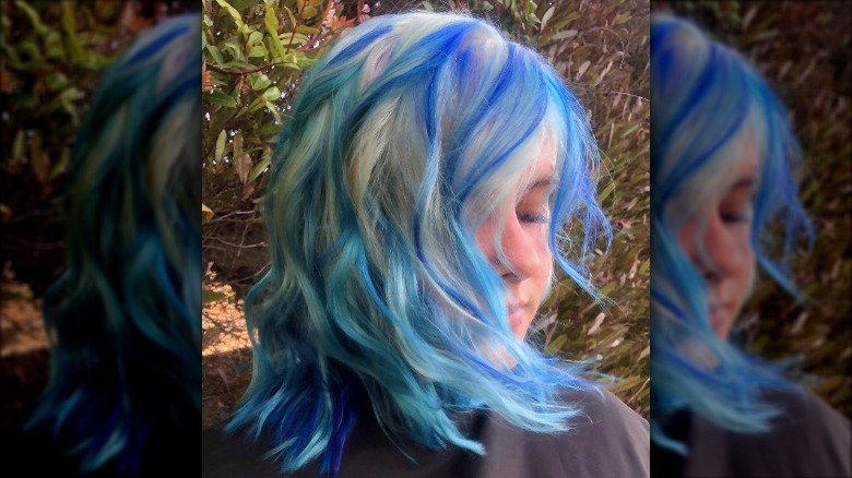 Medium white hair with blue lowlights