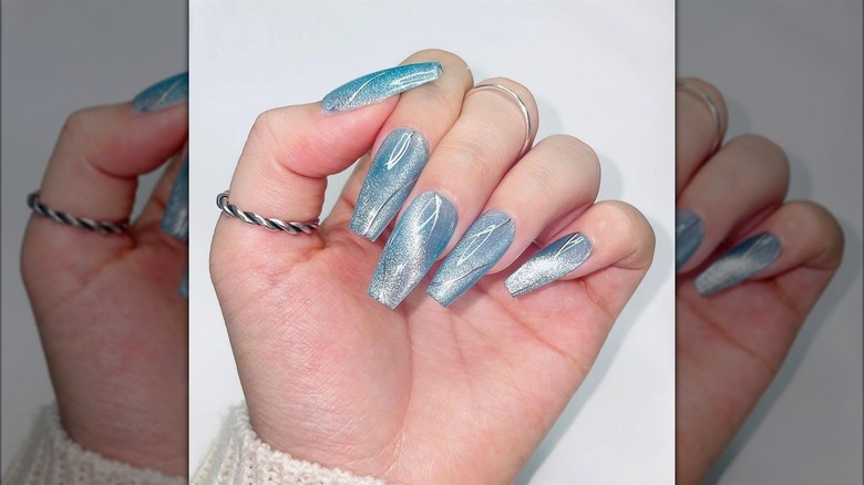 Blue velvet nails with silver lines