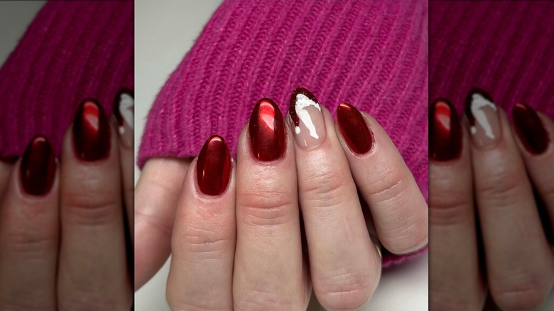 red chrome mani with santa hat nail