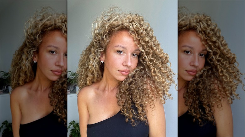 Woman with blonde curly hair