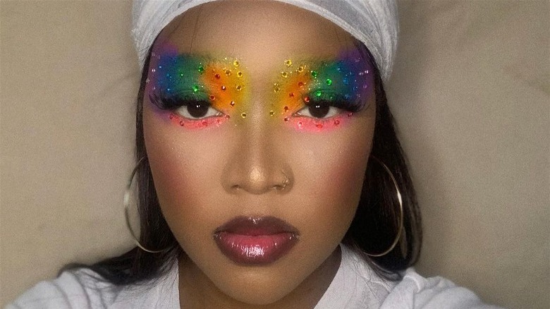 Woman with rainbow makeup