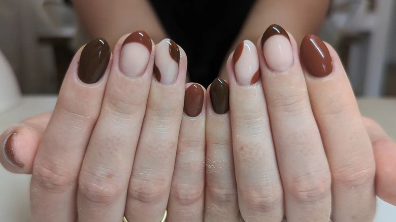 simple brown french manicure with negative space