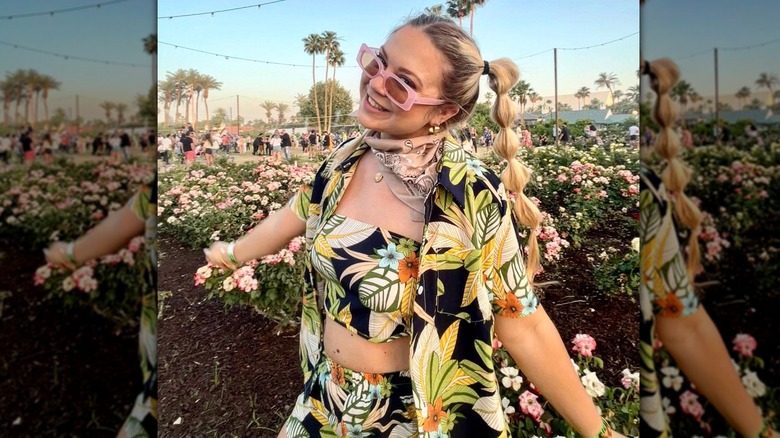 Person posing in floral cabana shirt
