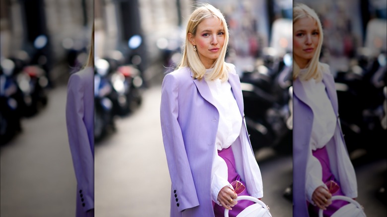 A woman in a purple blazer 