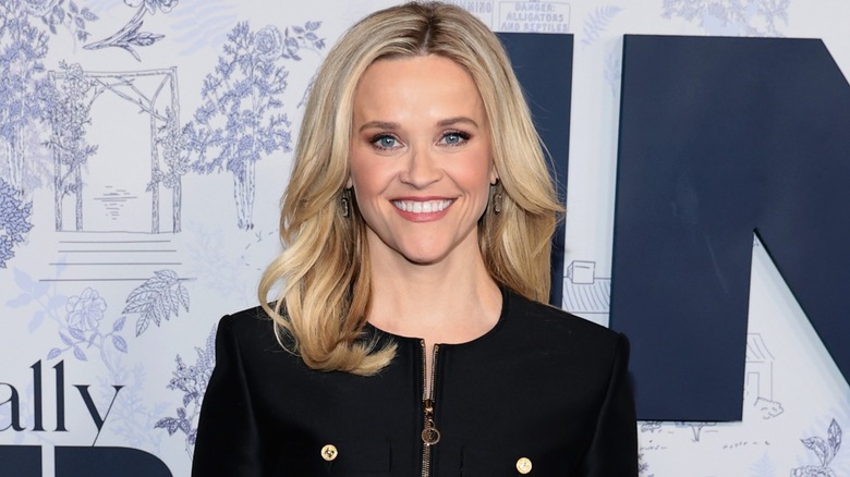 Reese Witherspoon smiling on the red carpet