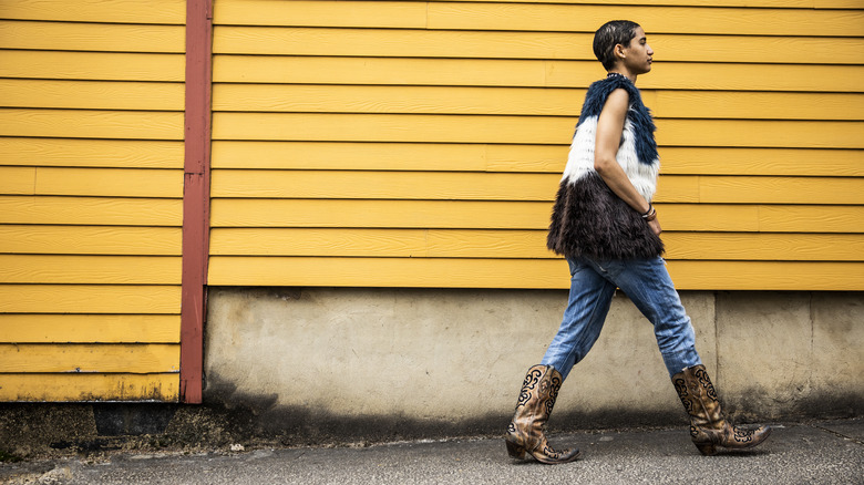 Woman in denim and cowboy boots 