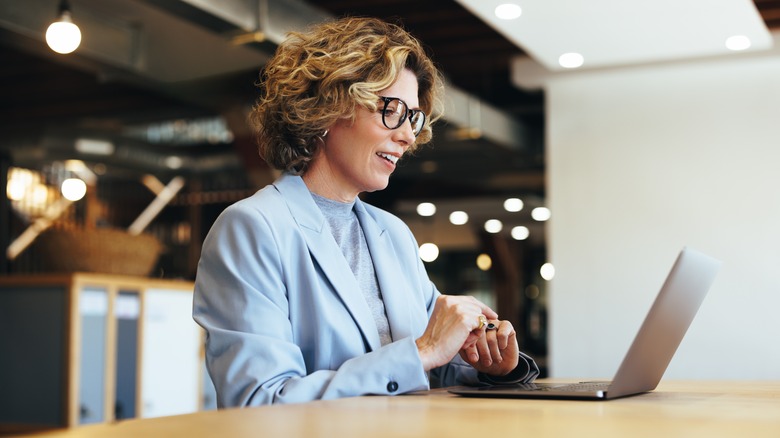 A woman at her laptop 