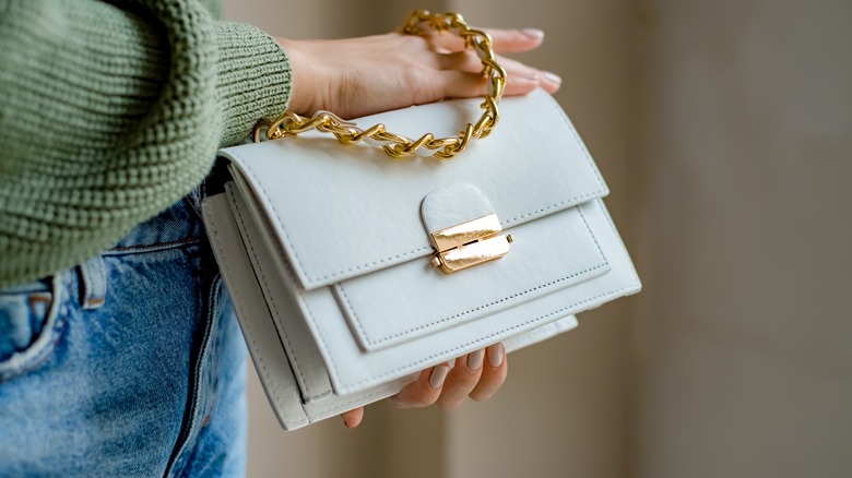 Clutch bag with gold handle