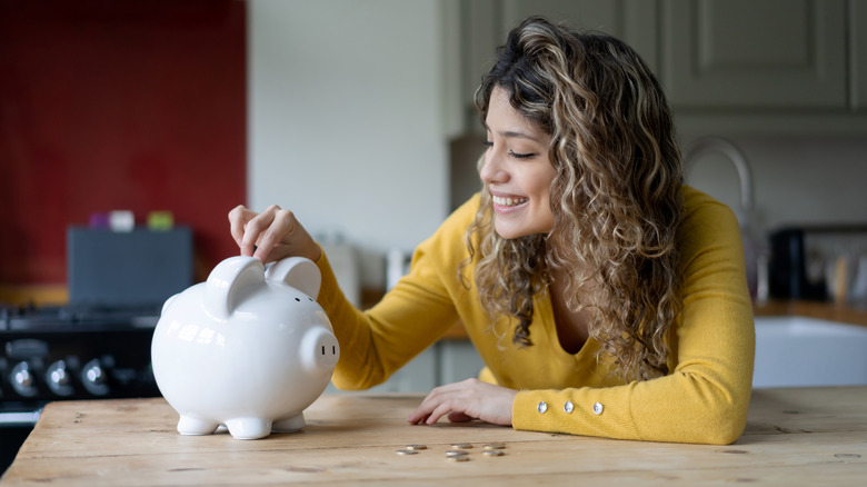 woman with a piggy bank