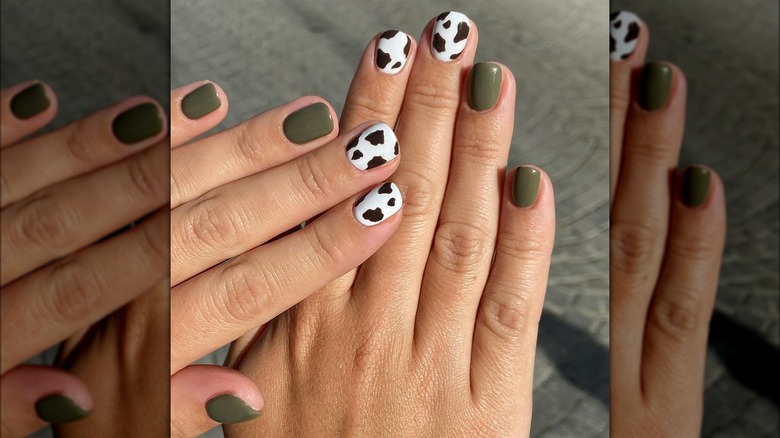 Green and cow print nails