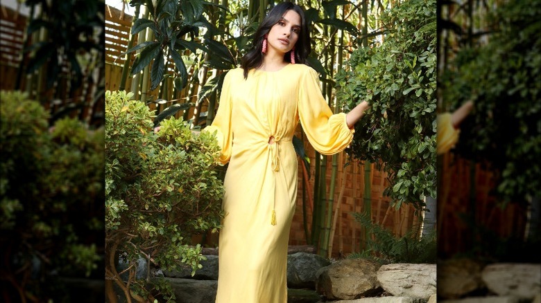Woman in a yellow cutout dress 