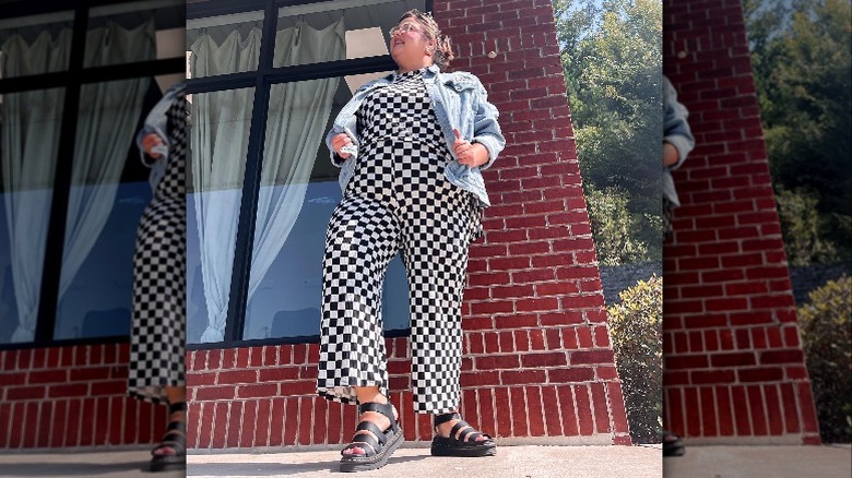 Person in checkered jumpsuit