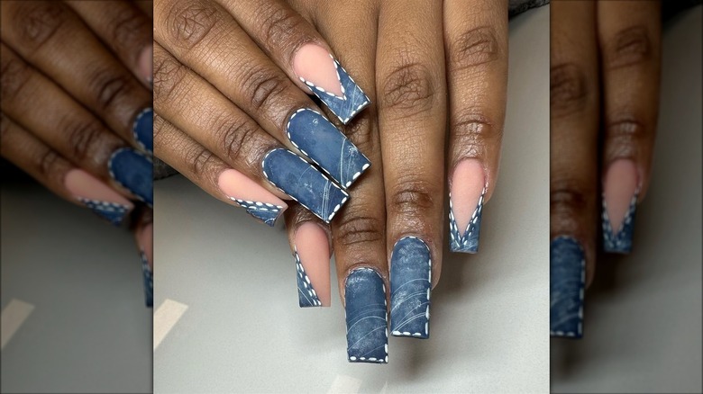 Person with denim look nails