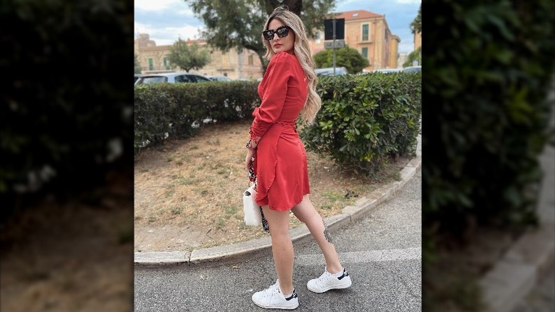 Red wrap dress with sneakers