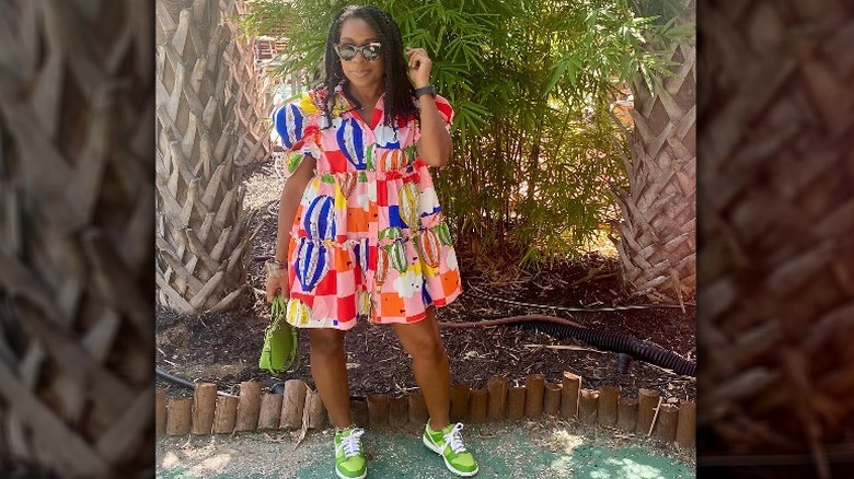 Patterned dress with green sneakers