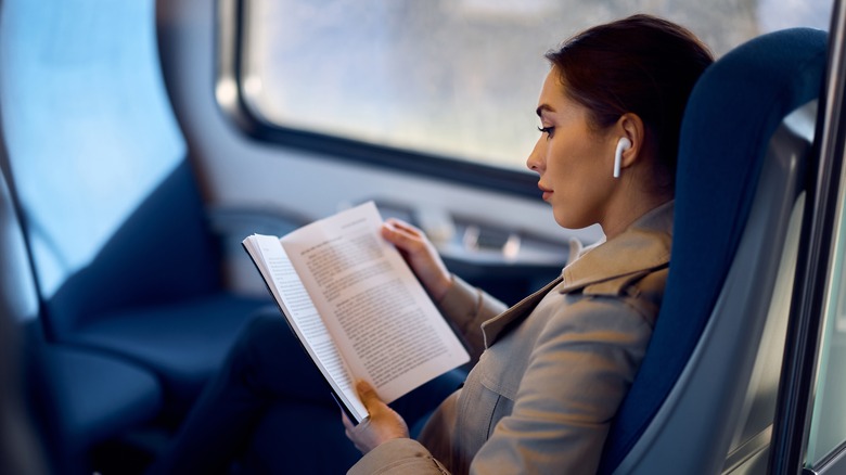 Woman reading on the train