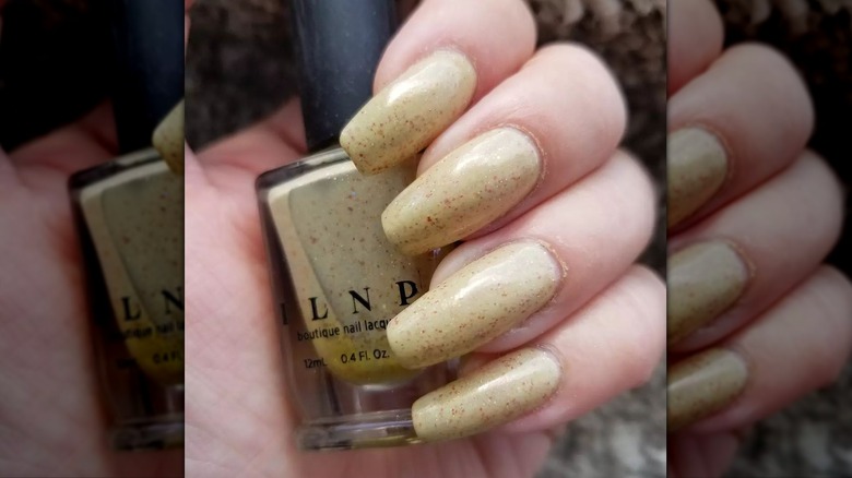 Yellow glitter nails
