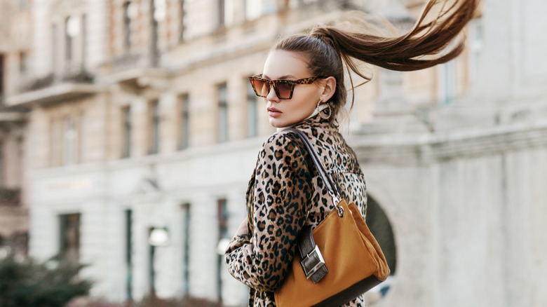 woman wearing leopard print blazer