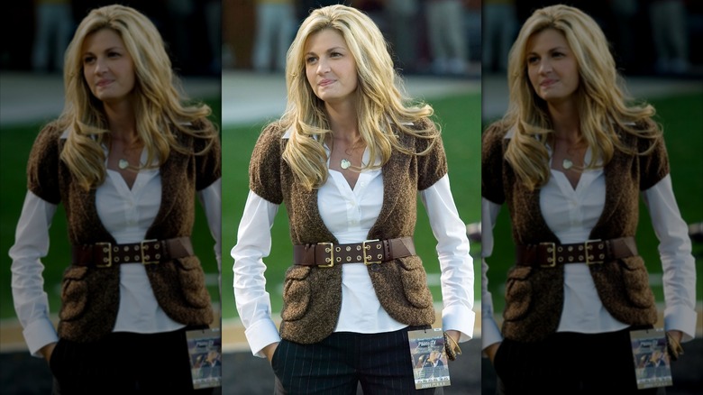 Erin Andrews standing with her hands in her pockets ahead of a college football game