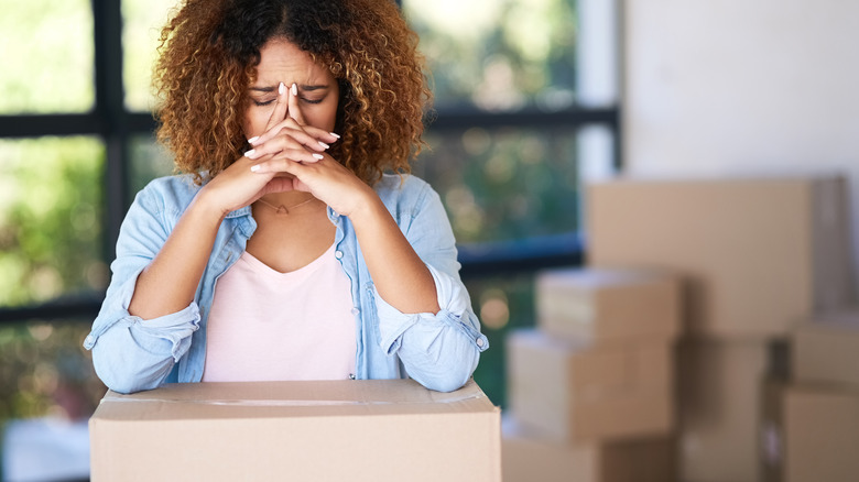 Woman sad about moving