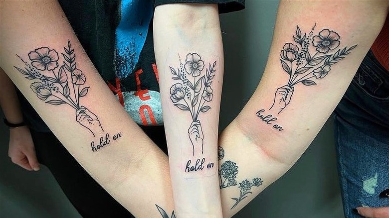 Flower matching tattoos